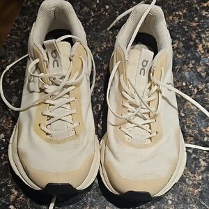 On Running White and Tan Sneakers